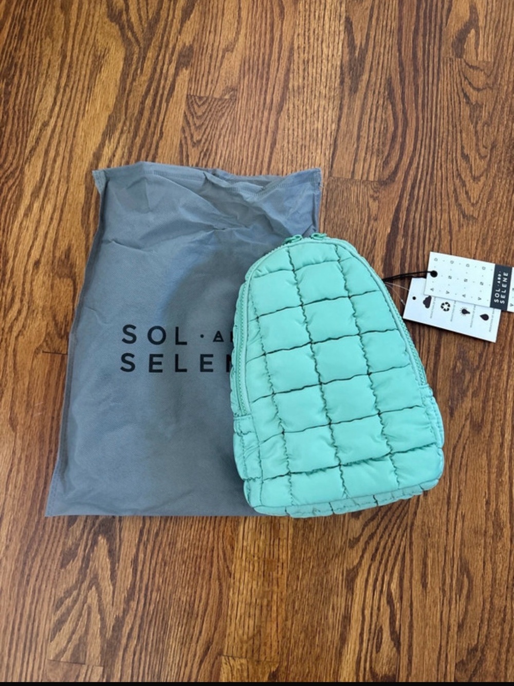 Sol and Selene Rejuvenate Quilted Puffy Sling Pack Bag Pistachio Green Backpack